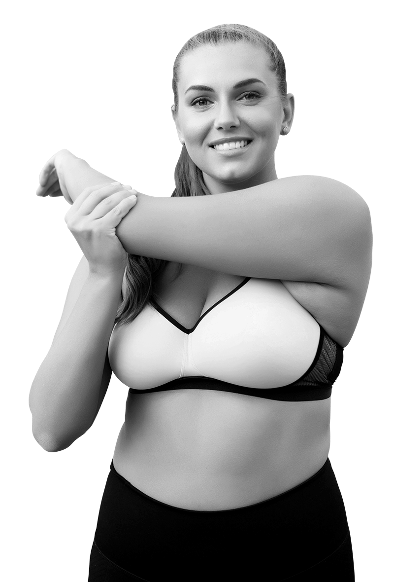 femme sportive bien dans son corps qui s'étire