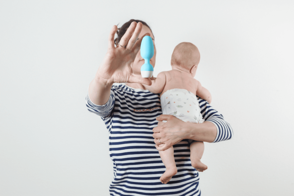 mum and her baby with emy in her hand